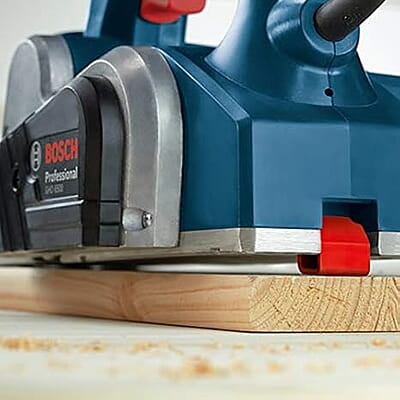 Bosch GHO 6500 Electric Planer, 650W, 2.6 mm Depth, 82 mm Width, 16,500 rpm, Optimized Air Flow, 2.8 kg + Hex Key, Parallel Guide, Sharpening Device & Setting Gauge For HSS Blade, 1 Year Warranty Bosch GHO 6500 Electric Planer, 650W, 2.6 mm Depth, 82 mm Width, 16,500 rpm, Optimized Air Flow, 2.8 kg + Hex Key, Parallel Guide, Sharpening Device & Setting Gauge For HSS Blade, 1 Year Warranty